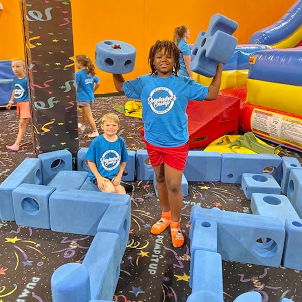 kids playing with large blocks